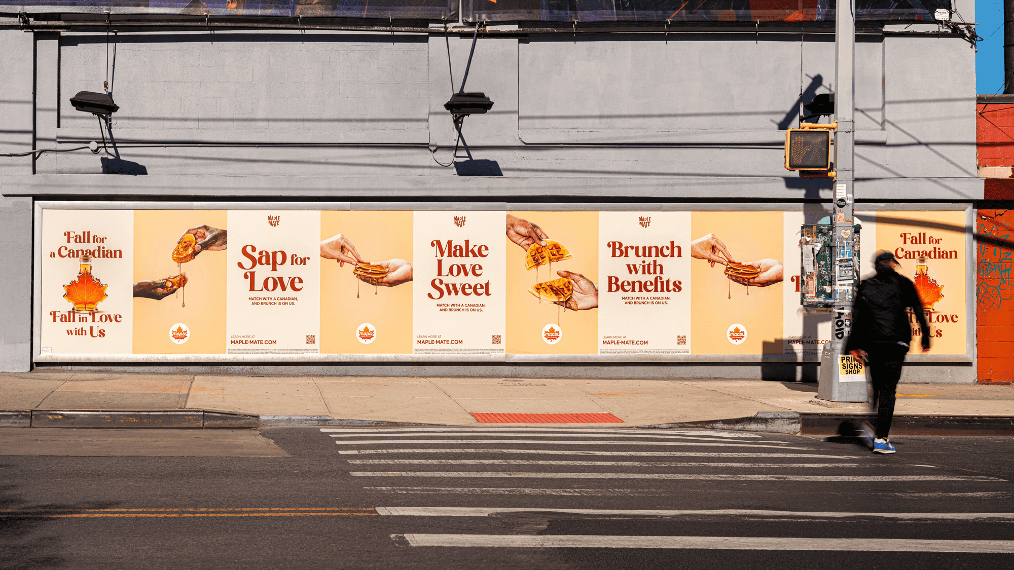 Outdoor banner promoting Maple Mate with slogans and branding elements.