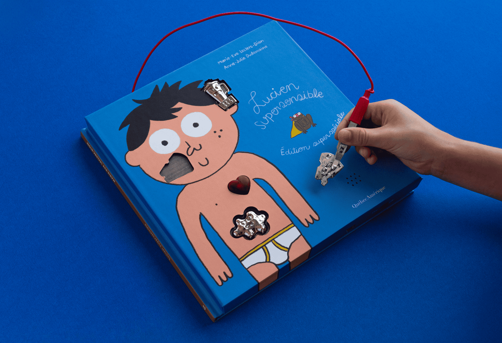 Interactive educational book about Lucien Supersensible with engaging illustrations.